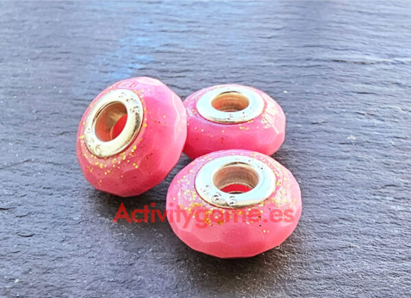 Charms rosa con brillo oro